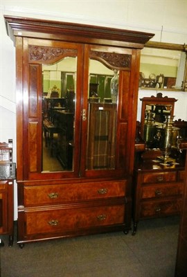 Lot 697 - An Edwardian walnut three piece bedroom suite comprising wardrobe, washstand and dressing table