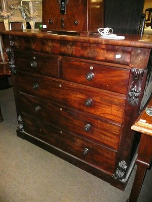 Lot 728 - A Victorian mahogany chest fitted with cushion shaped frieze drawer, with two short and three...