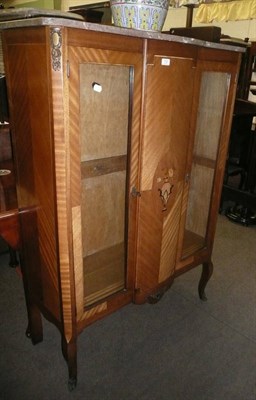 Lot 732 - An Art Deco inlaid mahogany bookcase with gilt metal mounts and a marble top