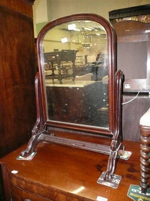 Lot 734 - A 19th century mahogany toilet mirror with arched plate, on standard supports and splay feet