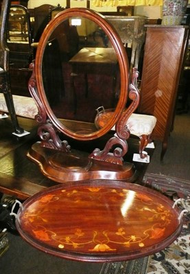 Lot 748 - An Edwardian inlaid mahogany oval tea tray and a Victorian mahogany toilet mirror