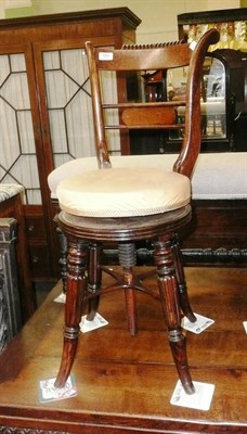 Lot 751 - Simulated rosewood piano stool