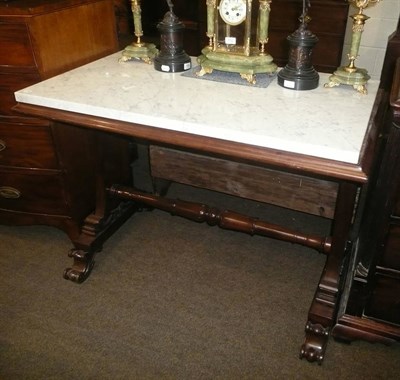 Lot 771 - A 19th century marble-top mahogany centre table