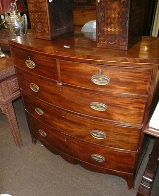 Lot 773 - Early 19th century mahogany four height bow-front chest