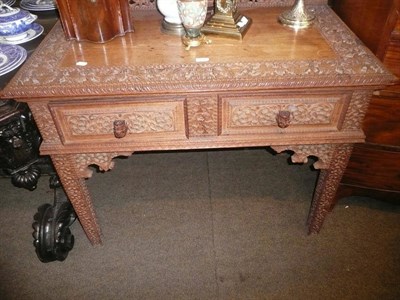 Lot 774 - An Anglo-Indian hardwood side table