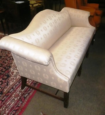 Lot 776 - A camel back settee