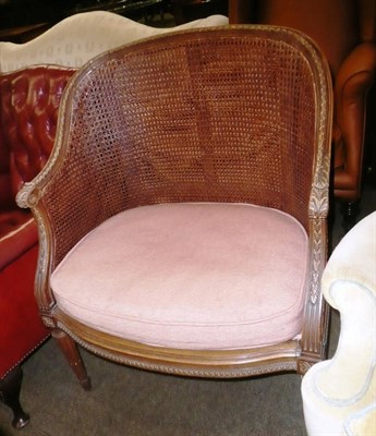 Lot 779 - A bergere armchair