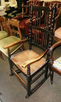 Lot 782 - 19th century bobbin wing rocking chair