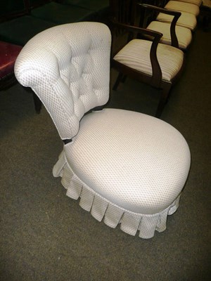 Lot 789 - Victorian low lady's chair in beige trellis fabric