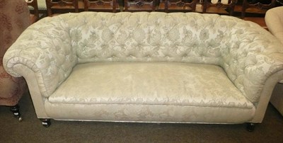 Lot 795 - A Victorian/Edwardian Chesterfield settee