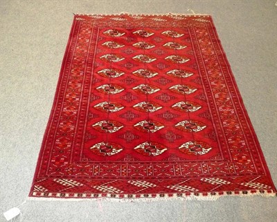 Lot 798 - Afghan Turkmen rug with claret field