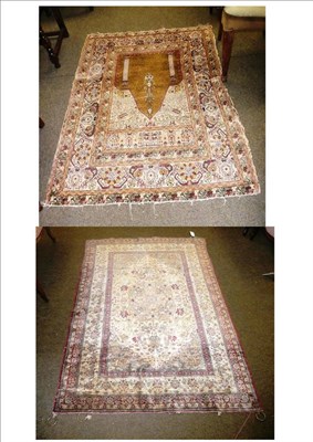 Lot 799 - Kayersi silk rug together with a Bursa silk rug (both damaged)