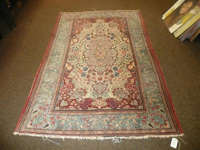 Lot 800 - Ghom rug with sky-blue pole medallion and border to the ivory field