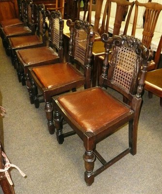 Lot 803 - A set of six Ercol carved oak chairs