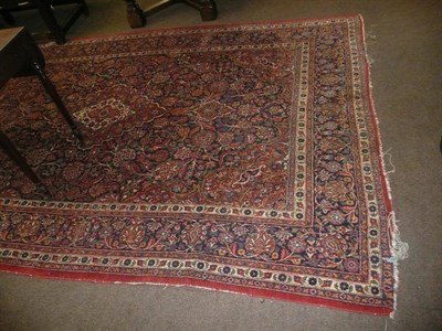 Lot 812 - Large Kashan carpet with pole medallion on navy field