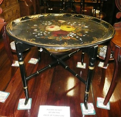 Lot 825 - A papier-mache tray top occasional table