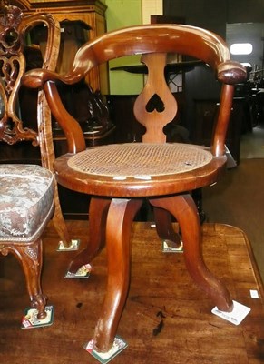 Lot 830 - Swivel chair