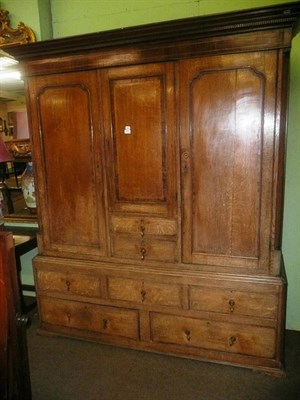 Lot 855 - 19th century oak combination wardrobe