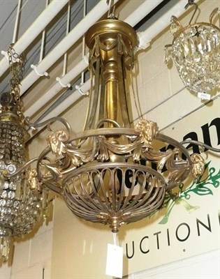 Lot 884 - Gilt metal Adams-style light fitting