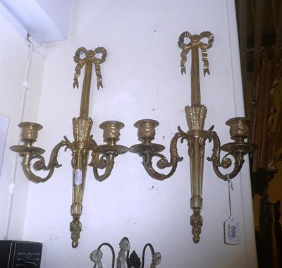 Lot 888 - Pair of ormolu two-branch wall sconces