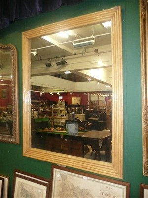 Lot 909 - A large caned framed mirror