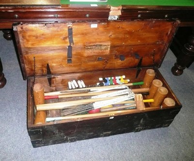 Lot 914 - A croquet set, boxed