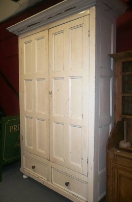 Lot 940 - A large painted pine cupboard