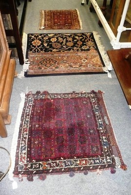 Lot 953 - Three small Oriental rugs