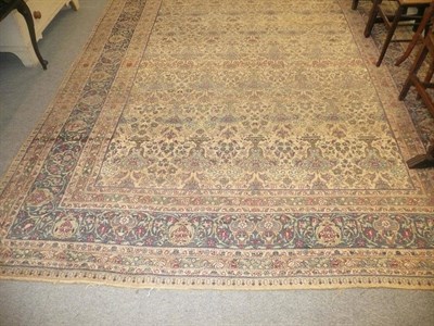 Lot 986 - Kirman carpet with all over design of urns issuing flowers