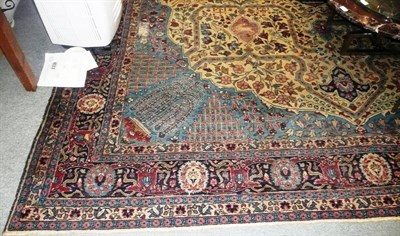 Lot 1022 - Khoy Tabriz carpet with navy centre and sky-blue spandrels to the camel field