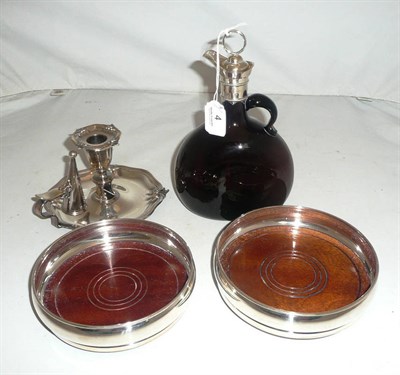 Lot 4 - Two silver coasters, plated chamber stick and brown glass flagon (4)