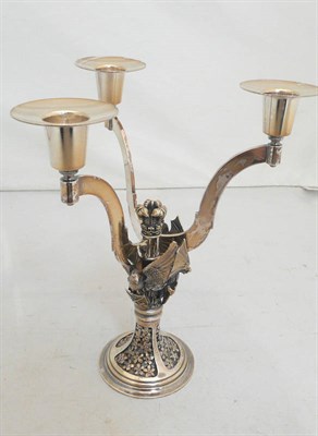 Lot 26 - Modern silver candelabrum decorated with winged animals holding shields, 19 oz