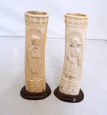 Lot 30 - A pair of prisoner of war carved bones, one carved with a boy, the other with a girl