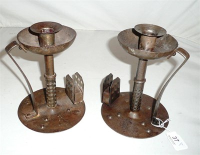 Lot 37 - A pair of Arts & Crafts candlesticks by Goldburg, retailed by Liberty's