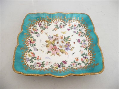 Lot 60 - An English porcelain dessert dish with turquoise borders, painted with a floral spray and...