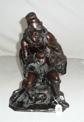 Lot 62 - Bronze figure of a man playing a Hurdy Gurdy