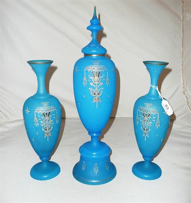 Lot 63 - A Victorian opaque blue glass three piece garniture