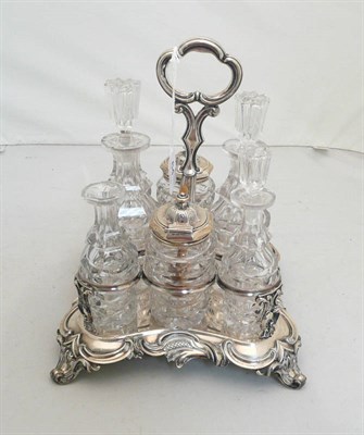 Lot 64 - A silver plate cruet stand with eight cut glass battles, some with silver mounts