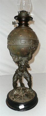 Lot 71 - A spelter figural oil lamp modelled as Hercules