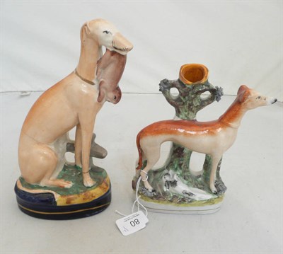 Lot 80 - A Staffordshire greyhound spill vase and a greyhound with hare