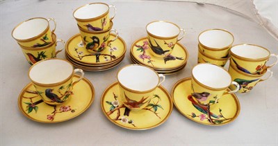 Lot 82 - Set of twelve Worcester yellow ground 'bird' painted tea set