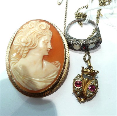 Lot 87 - Cameo brooch, seed pearl set coronet shaped hinged locket on chain and dress ring