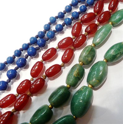 Lot 101 - A lapis lazuli bead necklace, an amber necklace and a green bead necklace