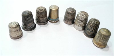 Lot 102 - Swedish enamel thimble and seven silver and white metal thimbles