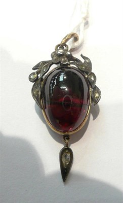 Lot 107 - A carbuncle garnet and diamond pendant (garnet cracked)