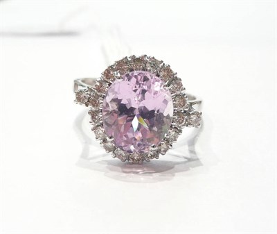 Lot 117 - A 14ct white gold kunzite and diamond cluster ring