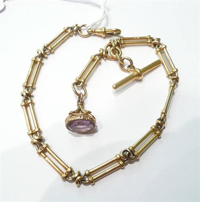 Lot 119 - 18ct gold watch chain with amethyst fob