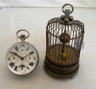 Lot 157 - Novelty clock modelled as a bird in a cage and a glass 'ball' watch (2)