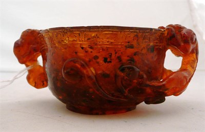Lot 160 - A carved libation cup