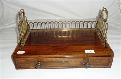 Lot 195 - Regency rosewood book rack